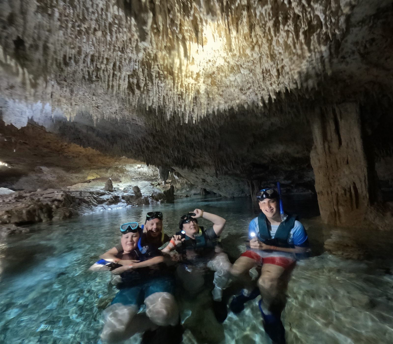 Josh’s family enjoying a cave swim